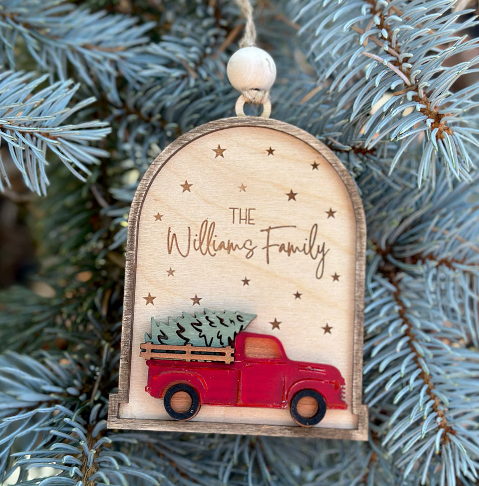 Red truck with tree family ornament