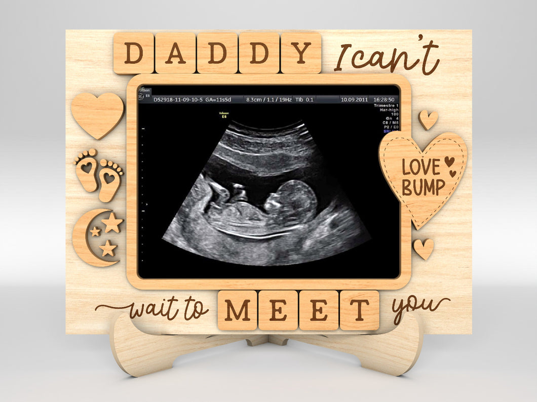 Father to be frame for ultrasound photo