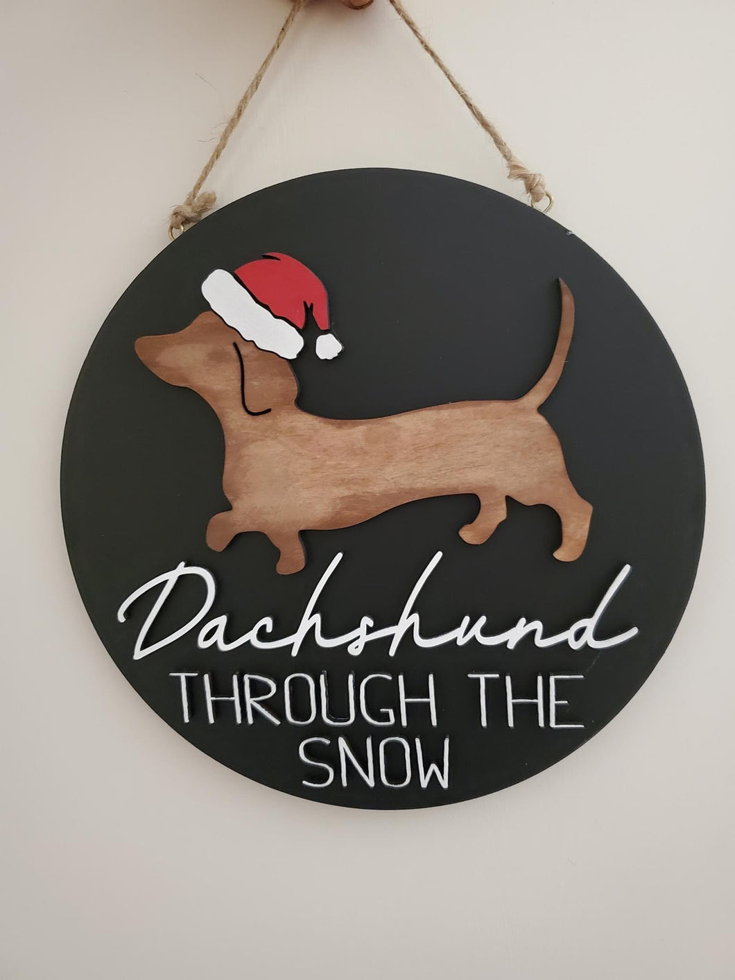 Dachshund through the snow door hanger